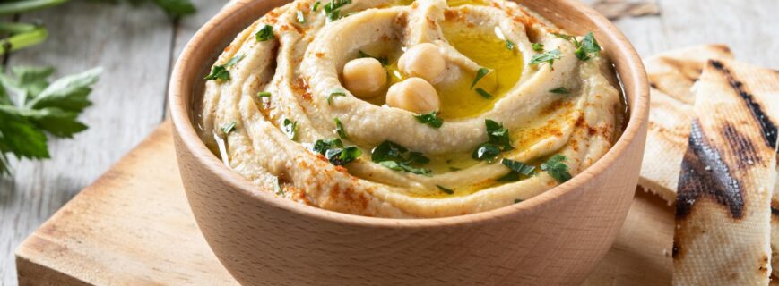 chickpea-hummus-rustic-wooden-table_123827-22472