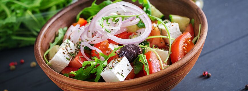 greek-salad-with-fresh-tomato-cucumber-red-onion-basil-feta-cheese-black-olives-italian-herbs_2829-4480