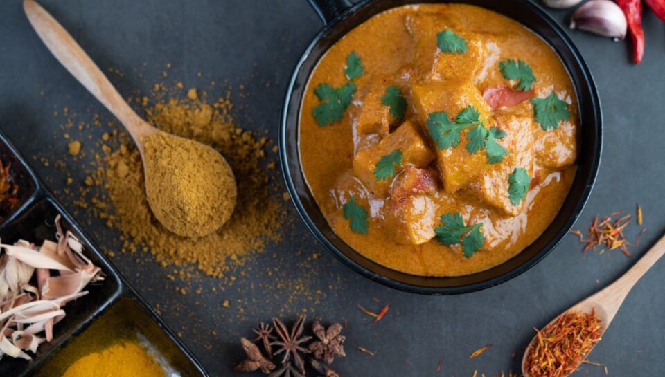 massaman-curry-frying-pan-with-spices-cement-floor_1150-20779