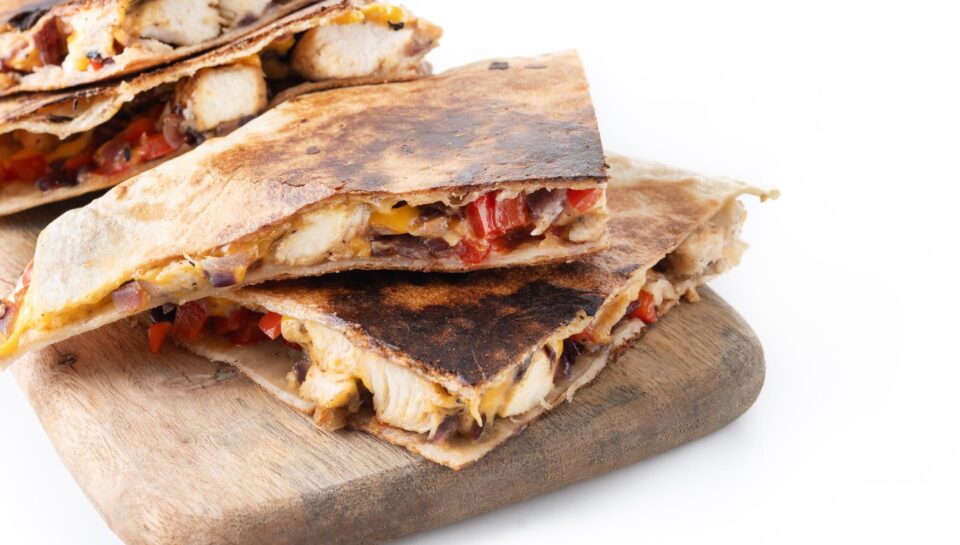 mexican-chicken-quesadillas-with-cheese-peppers-isolated-white-background_123827-26427