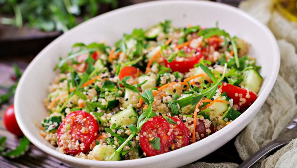 salads-with-quinoa-arugula-radish-tomatoes-cucumber-bowl-wooden-table-healthy-food-diet-detox-vegetarian-concept_2829-6842