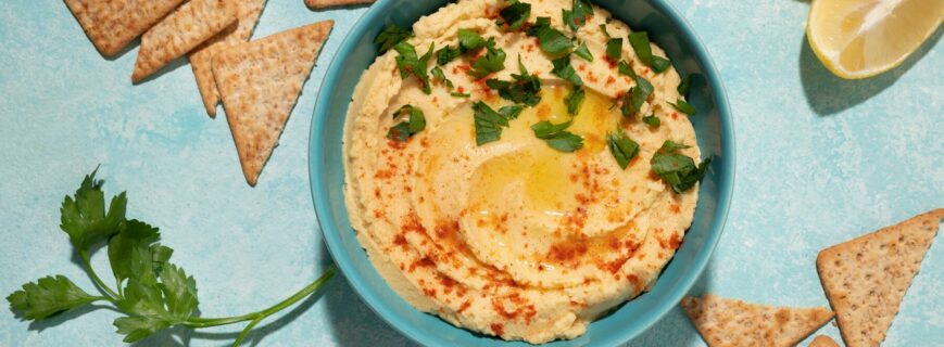 top-view-hummus-crackers-arrangement_23-2149483851